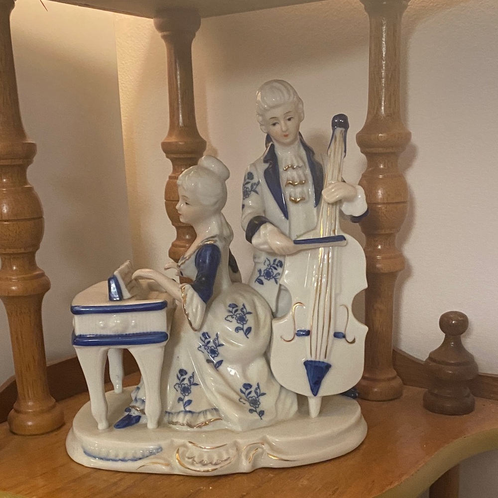 Elegant Blue and White Musician Figurine